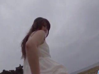 Mayuka Akimoto shows off her hairy twat in outdoor scenes