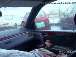 Hairy pussy Russian stunner fucks in the car in public